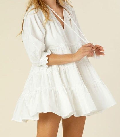 Tiered mini dress with tassel